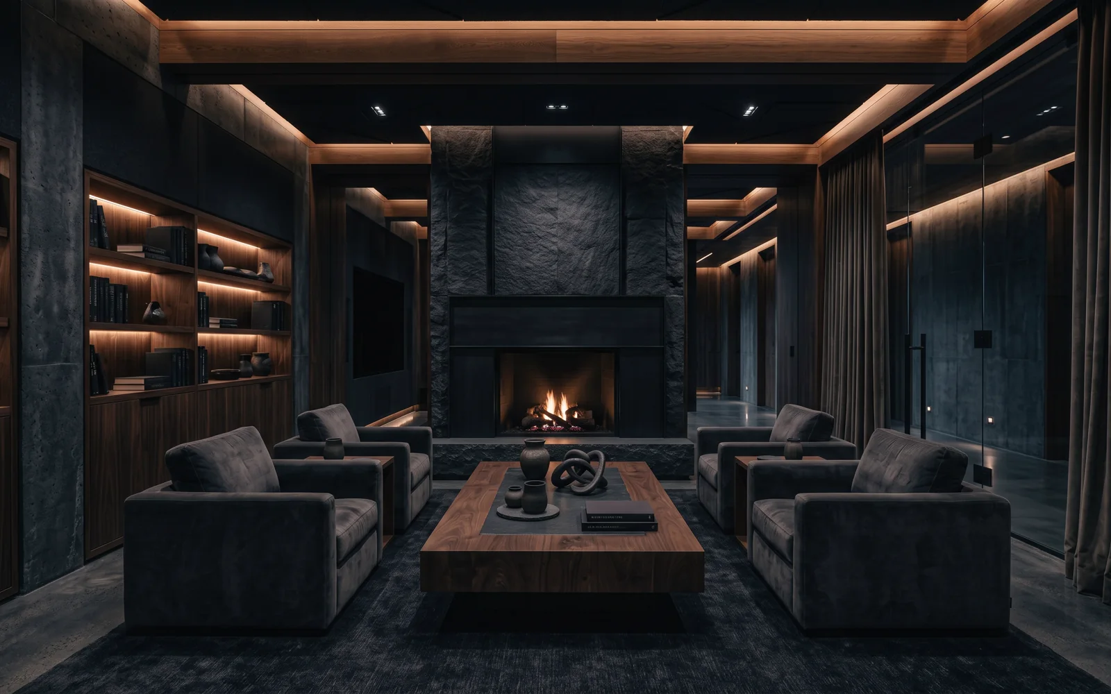 Lounge privado con chimenea de piedra, libreros y sillones de lectura