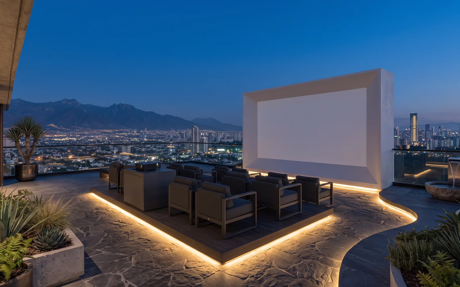 Cine al aire libre en rooftop con pantalla de proyección y sillones lounge